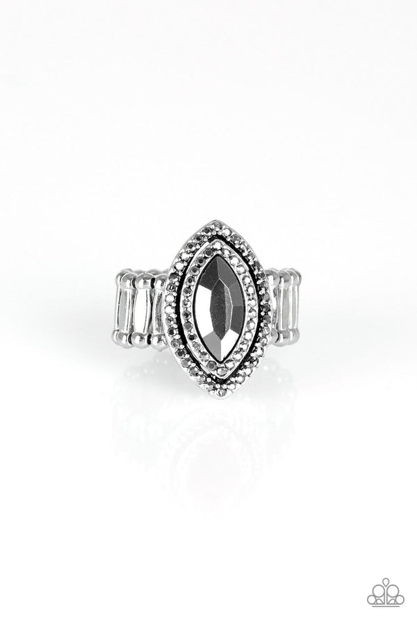 Modern Millionaire-Rhinestone Paparazzi Ring-Jazzi Jewelz Boutique by Raven   Featuring a regal marquise style cut, a glittery hematite gem is pressed into the center of stacked silver frames radiating with glittery hematite rhinestones for a glamorous finish. Features a stretchy band for a flexible fit.  Sold as one individual ring.