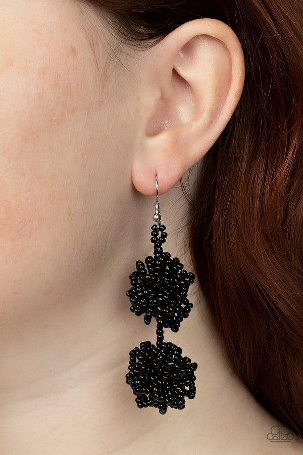 CELESTIAL COLLISION-BLACK SEED BEAD EARRIINGS-JAZZI JEWELZ BOUTIQUE BY RAVEN  Strands of shiny black seed beads delicately knot into an elegantly clustered lure, creating a stellar modern look. Earring attaches to a standard fishhook fitting.  Sold as one pair of earrings.  All Paparazzi Accessories are lead free and nickel free. Jazzi Jewelz Boutique by Raven.