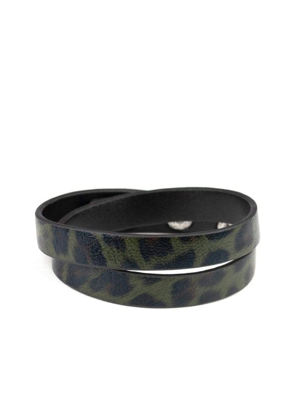 Featuring a green and black cheetah pattern, a strip of black leather double wraps around the wrist for a wild look. Features an adjustable snap closure. Sold as one individual bracelet.  All Paparazzi Jewelry is 100% lead free and nickel free. 