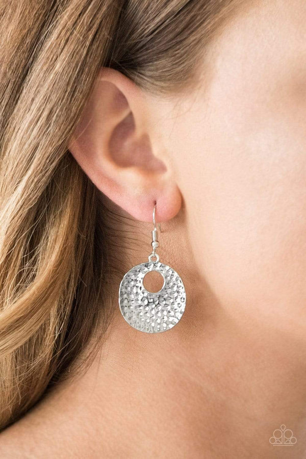 A Taste For Texture-Silver Paparazzi Earrings-Jazzi Jewelz Boutique by Raven Embossed in tactile textures, a shimmery silver frame swings from the ear for an edgy look. Earring attaches to a standard fishhook fitting. Sold as one pair of earrings.  All Paparazzi Jewelry is 100% lead free and nickel free.
