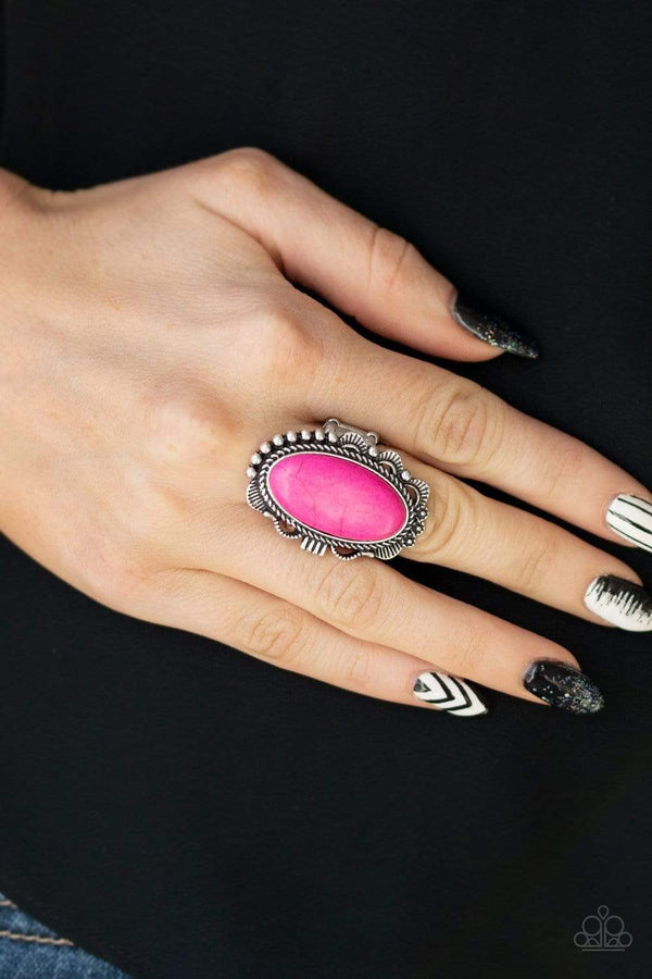 Open Range-Pink Ring-Jazzi Jewelz Boutique by Raven A vivacious pink stone is pressed into an ornate silver frame rippling with studded and serrated textures for a seasonal flair. Features a stretchy band for a flexible fit. Sold as one individual ring.