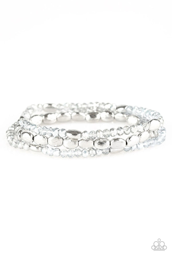 Hello Beautiful-Silver Bracelet-Jazzi Jewelz Boutique by Raven   Infused with hints of silver, dainty smoky and metallic crystal-like beads are threaded along stretchy bands, creating whimsical layers across the wrist.  Sold as one set of three bracelets.  All Paparazzi Jewelry is lead free and nickel free. 