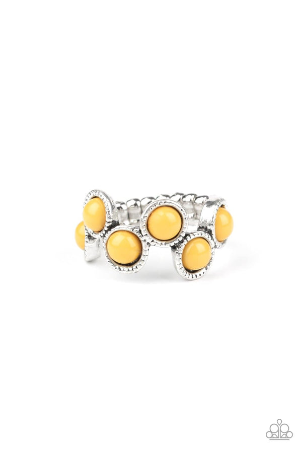 Foxy Fabulous-Yellow Paparazzi Ring-Jazzi Jewelz Boutique by Raven   Party yellow beads are pressed into sleek studded silver frames. The colorful beads zigzag across the finger, coalescing into a whimsical frame. Features a dainty stretchy band for a flexible fit.  Sold as one individual ring.