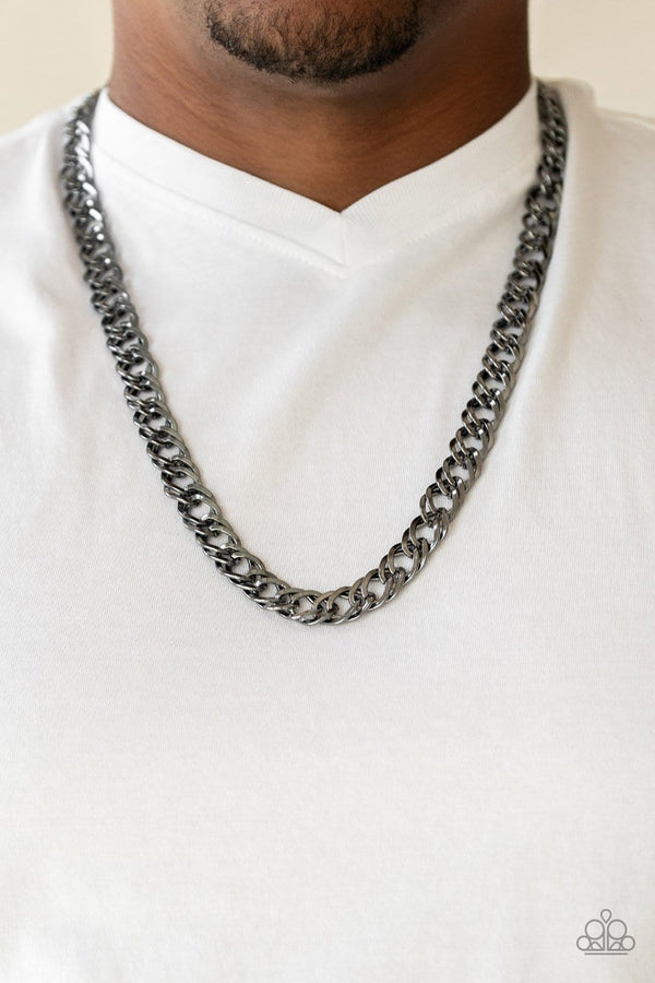 Undefeated- Black Men's Necklace-Jazzi Jewelz Boutique by Raven  Featuring doubled links, a glistening gunmetal chain drapes across the chest for a bold look. Features an adjustable clasp closure.  Sold as one individual necklace.  MAKE & MATERIAL: Built with highly durable products, 100% brand new and high quality, gorgeous, stylish, and perfect for gifting. 100% Nickel and Lead-Free