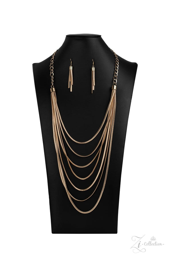 Commanding-2020 Zi Collection-Gold Necklace-Jazzi Jewelz Boutique by Raven  Dramatically capped in bold fittings, lengthened rows of gold herringbone chains layer flawlessly together across the chest. The sleek display attaches to strands of oversized gold links, adding a gritty industrial edge to this majestic masterpiece. Features an adjustable clasp closure.  Sold as one individual necklace. Includes one pair of matching earrings.