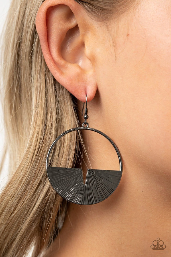 ﻿Reimagined Refinement-Black Paparazzi Hoop Earrings-Jazzi Jewelz Boutique by Raven  Embossed in radiant linear textures, a crescent gunmetal frame is nestled along the bottom of a textured gunmetal hoop for an edgy look. Earring attaches to a standard fishhook fitting.  Sold as one pair of earrings.  All Paparazzi Accessories are lead free and nickel free. 