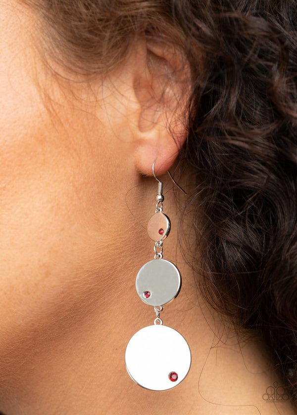 Poshly Polished-Silver Paparazzi Earrings-Jazzi Jewelz Boutique by Raven  Haphazardly dotted in glittery red rhinestones, three shiny silver discs gradually increase in size as they trickle from the ear for a sleek look. Earring attaches to a standard fishhook fitting.  Sold as one pair of earrings.  All Paparazzi Accessories are lead free and nickel free. 