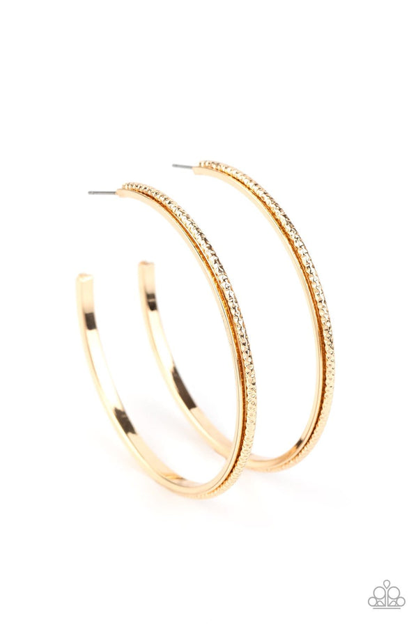 ﻿Sultry Shimmer-Gold Paparazzi Earrings-Jazzi Jewelz Boutique by Raven  Featuring shimmery diamond-cut texture, a glistening gold bar lines the center of a beveled gold hoop, creating an edgy stacked look. Earring attaches to a standard post fitting. Hoop measures approximately 2 1/2" in diameter.  Sold as one pair of hoop earrings.  Paparazzi Accessories are lead free and nickel free.