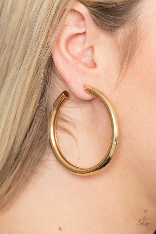 ﻿Curve Ball-Gold Paparazzi Hoop Earrings  A thick gold bar delicately curls into a glistening oversized hoop for a retro look. Earring attaches to a standard post fitting. Hoop measures approximately 2 1/4
