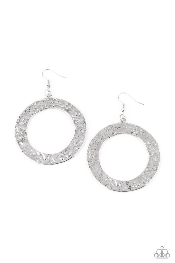 PRIMAL Meridian-Silver Paparazzi Earrings-Jazzi Jewelz Boutique by Raven  Brushed in a rustic silver finish, a flat circular frame has been hammered in blinding detail for a handcrafted look. Earring attaches to a standard fishhook fitting.  Sold as one pair of earrings.  All Paparazzi Accessories are lead free and nickel free.