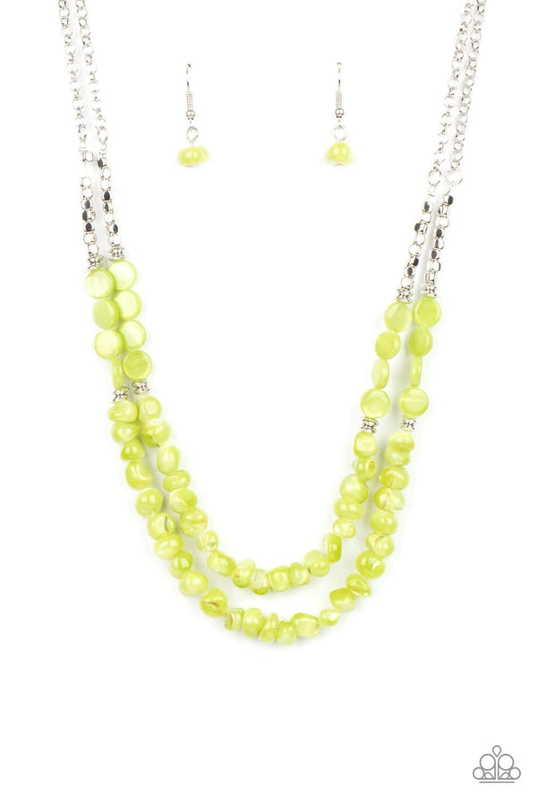 Staycation Status-Green Paparazzi Necklace-Jazzi Jewelz Boutique by Raven  Infused with dainty silver cube and round beaded accents, green shell-like beads are threaded along invisible wires below the collar for a summery inspiration. Features an adjustable clasp closure.  Sold as one individual necklace. Includes one pair of matching earrings.  All Paparazzi Accessories are lead free and nickel free. 