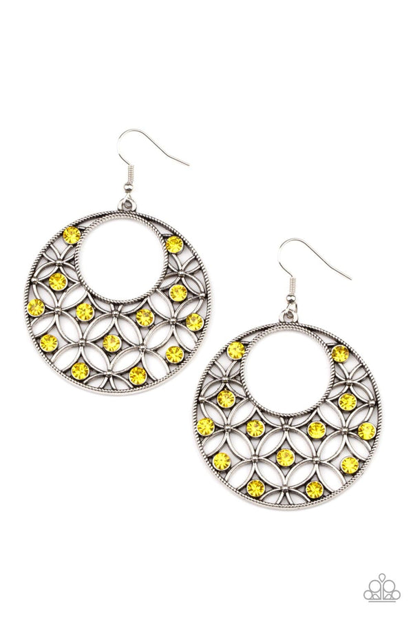 ﻿Garden Garnish-Yellow Rhinestone Paparazzi Earrings-Jazzi Jewelz Boutique by Raven  Dotted with glittery Illuminating rhinestones, an airy backdrop of antiqued flowers climb a studded silver hoop for a whimsical look. Earring attaches to a standard fishhook fitting.  Sold as one pair of earrings.  All Paparazzi Accessories are lead free and nickel free. 