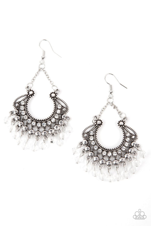 ﻿GLOW Down In Flames-White Paparazzi Earrings-Jazzi Jewelz Boutique by Raven  White rhinestone dotted petals fan out into a studded scalloped frame. Glittery white crystal-like beads swing from the bottom of a decorative silver frame, creating a glamorous fringe. Earring attaches to a standard fishhook fitting.  Sold as one pair of earrings.