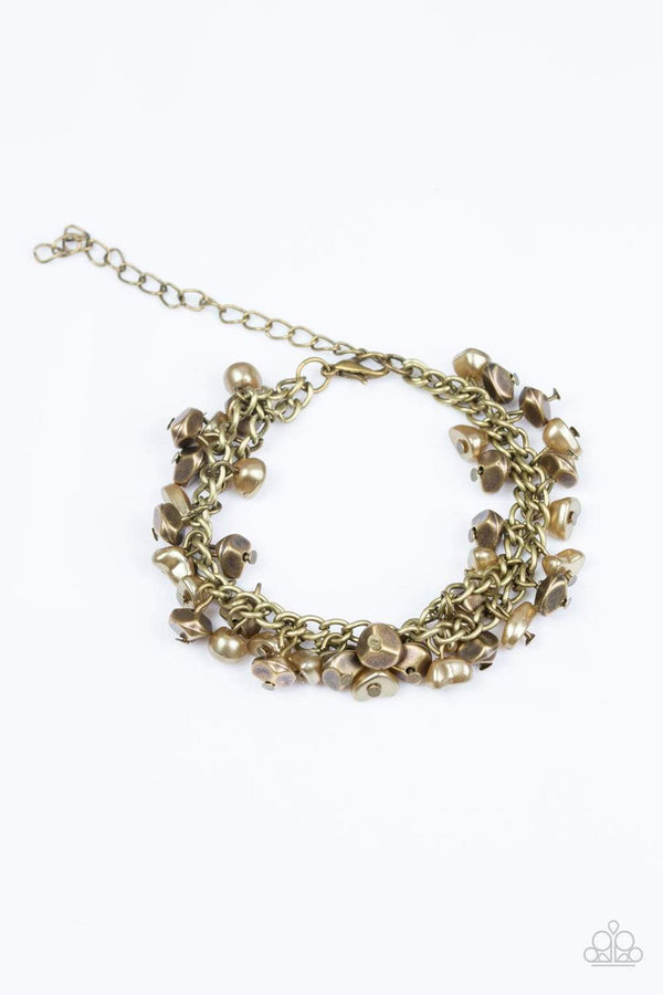 Seaside Social-Brass Paparazzi Bracelet  Bracelet with faceted brass and pearly brass beads swing from two brass chains, creating a refined fringe around the wrist. Features an adjustable clasp closure.  Sold as one individual bracelet.  Paparazzi Jewelry is always 100% lead free and nickel free. 