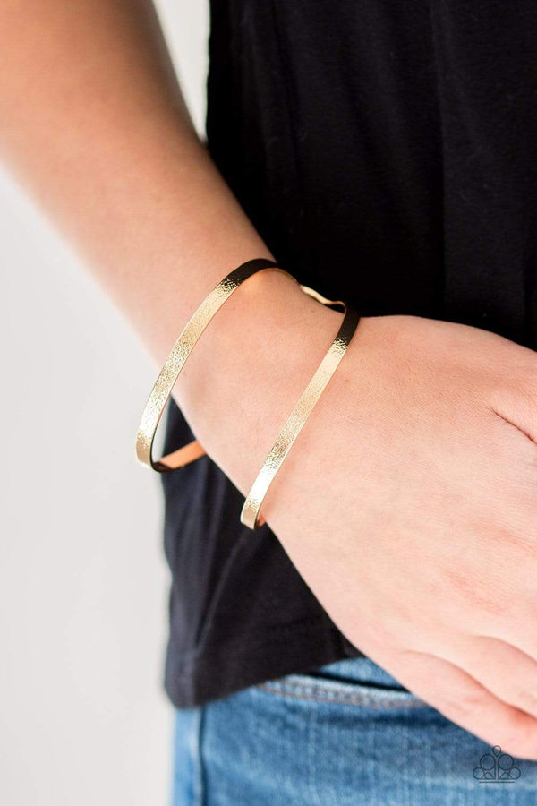 ﻿﻿Grenada Goddess-Gold Bracelet﻿﻿﻿ Delicately hammered in shimmer, glistening gold bars form a cuff  