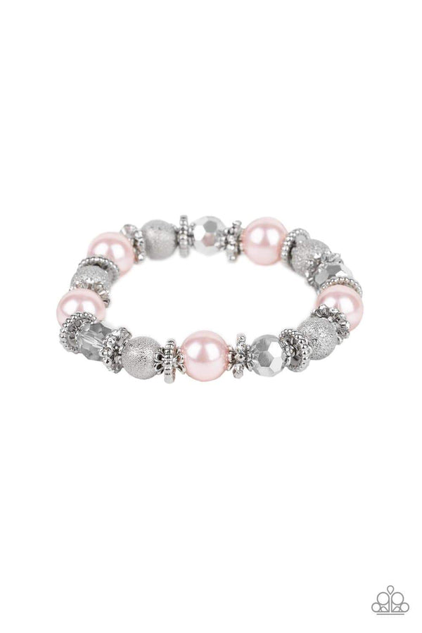 Sparking Conversation-Pink & Silver Paparazzi Bracelet-Jazzi Jewelz Boutique By Raven  A sparkling collision of pearly pink beads, shimmery silver accents, faceted metallic crystals, and white rhinestone encrusted rings are threaded along a stretchy band around the wrist for a refined flair. Sold as one individual bracelet.  All Paparazzi Jewelry is 100% lead free and nickel free.
