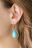 Sahara Serenity-Brass Paparazzi Earrings-Jazzi Jewelz Boutique by Raven  Chiseled into a tranquil teardrop, a refreshing turquoise stone is pressed into a shimmery brass frame radiating with tribal inspired textures for a seasonal look. Earring attaches to a standard fishhook fitting.  Sold as one pair of earrings.  Paparazzi Jewelry is always lead free and nickel free. 