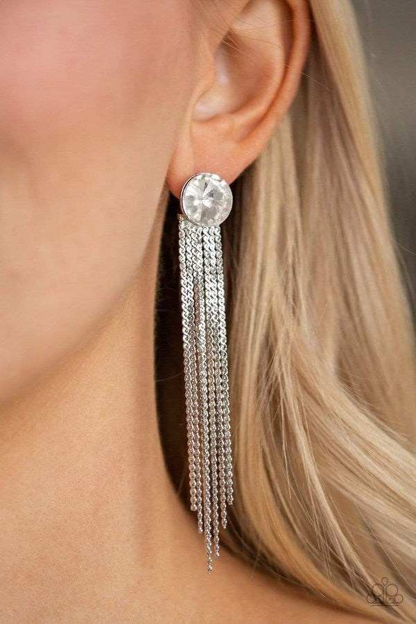 ﻿Level Up-Silver Paparazzi Earrings-Jazzi Jewelz Boutique by Raven   Flat silver chains stream from the bottom of a solitaire white gem, creating a dramatically tapered fringe. Earring attaches to a standard post fitting.  Sold as one pair of post earrings.  Paparazzi Jewelry is lead free and nickel free.