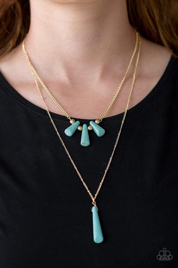 ﻿Basic Groundwork-Turquoise Necklace-Jazzi Jewelz Boutique by Raven  Gold necklace chiseled into flared teardrop shapes, a dainty fringe of turquoise stones and golden beads gives way to a large stone pendant, creating earthy layers down the chest. 